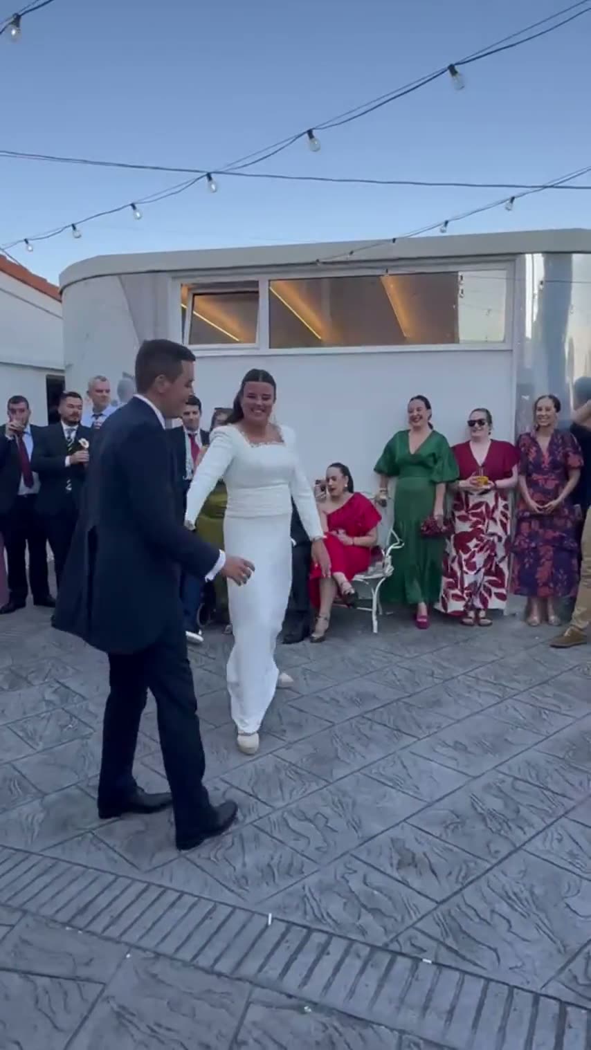Play video of a real couple's first dance